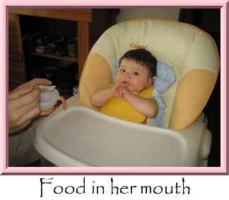 Food in her mouth Thumbnail
